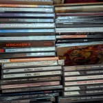 A stack of CDs that I haven't listened to